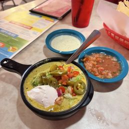 Boom-Boom Pow queso (Queso w/ boom-boom sauce, refried beans, lettuce, pico, jalapeños, sour cream, & guac!!)