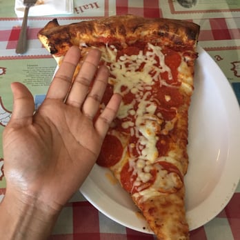 Pizza D'Oro - The giant slice - Pizza Near Me - Costa Mesa, California Pizza D'Oro - The giant slice - Pizza Near Me - Costa Mesa, California