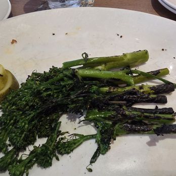Yard House - Burnt broccolini Yardhouse proudly served. - New American Near Me - Boca Raton, Florida Yard House - Burnt broccolini Yardhouse proudly served. - New American Near Me - Boca Raton, Florida