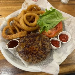Fuddruckers - Elk burger with rings.