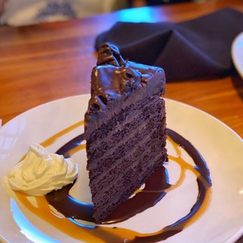 Lakeside Bar & Grill - a slice of chocolate cake on a plate - American Near Me - Portland, Oregon Lakeside Bar & Grill - a slice of chocolate cake on a plate - American Near Me - Portland, Oregon