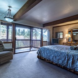 Tahoe All Seasons Properties - Master bedroom at one of our Pinewild town homes for rent