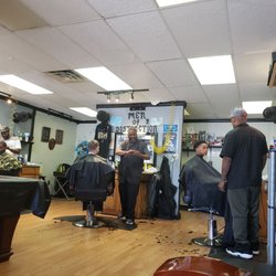 Men of Distinction - Three barbers here