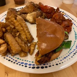 1/2 of the Blackened Fish Sandwich, fries, garlic Parmesan and Buffalo 7 Starr Wings