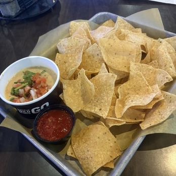 Buffalo Wild Wings - Hatch Queso.  Good, but only a half cup of queso and a tiny cup of salsa.   Don't be so skimpy! - American Near Me - Grand Island, Nebraska
