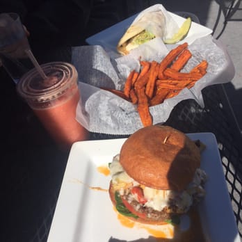 Chomp - Peachberry smoothie, artichoke burger, sweet potato fries, Nikki pita - American Near Me - Rochester, Michigan Chomp - Peachberry smoothie, artichoke burger, sweet potato fries, Nikki pita - American Near Me - Rochester, Michigan