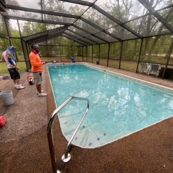 Sugarmill Woods Pool & Spa - Pool and patio before remodel