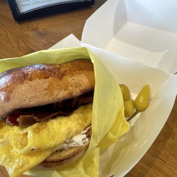 Cafe Donuts - Breakfast bagel cream cheese bacon and egg. Side of Chili's. - Coffee & Tea Near Me - West Covina, California