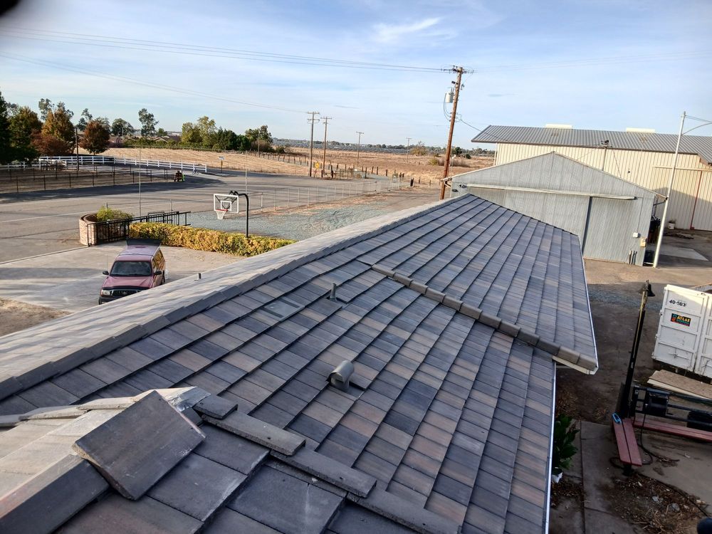 Slide of Prestige Roofing