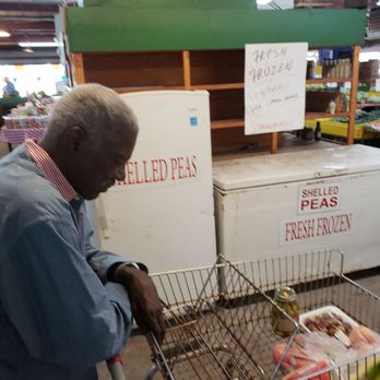 Hempstead Fruit Stand-Diiorio - a man pushing a shopping cart filled with fruit - Grocery Near Me - Hempstead, Texas Hempstead Fruit Stand-Diiorio - a man pushing a shopping cart filled with fruit - Grocery Near Me - Hempstead, Texas