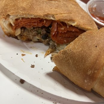 Nelly's Italian Cafe - Supreme calzone - Pizza Near Me - Spring Hill, Tennessee Nelly's Italian Cafe - Supreme calzone - Pizza Near Me - Spring Hill, Tennessee