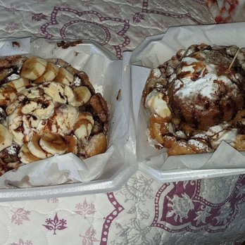 Social Ice - Funnel cake w. vanilla ice cream, powdered sugar, chocolate drizzle, nutella, & bananas, other w. fried ice cream & chocolate drizzle. - Desserts Near Me - El Paso, Texas Social Ice - Funnel cake w. vanilla ice cream, powdered sugar, chocolate drizzle, nutella, & bananas, other w. fried ice cream & chocolate drizzle. - Desserts Near Me - El Paso, Texas