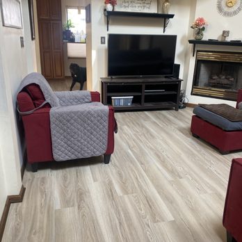 Flanco Flooring - a living room with a couch, chair, television, and fireplace - Flooring Near Me - Norridge, Illinois Flanco Flooring - a living room with a couch, chair, television, and fireplace - Flooring Near Me - Norridge, Illinois