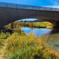 Woodside RV Resort - Bridge at Show Low Bluffs over the creek