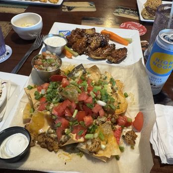 Swordfish Grill & Tiki bar - Loaded shrimp nachos and wings - Seafood Near Me - Cortez, Florida Swordfish Grill & Tiki bar - Loaded shrimp nachos and wings - Seafood Near Me - Cortez, Florida
