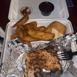 Grilled chicken "breast" and fries.