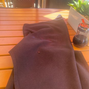 Breakfast Bitch - Water that's still spilling on table after Waitress moved umbrella and let water drip into my food. - Breakfast & Brunch Near Me - Phoenix, Arizona