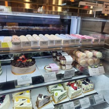 Tous Les Jours - Macarons, Cakes, and Individual Cake slices inside display case. - Bakeries Near Me - Fullerton, California