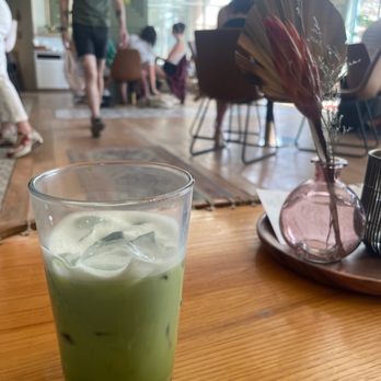 Hello Darling - Iced oat milk matcha latte that's been drank from a few times - Coffee & Tea Near Me - Denver, Colorado