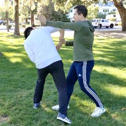 Five Styles School - Practicing Wing Chun Kung Fu training exercise called Chi Sau (Sticking Hands)