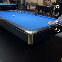 a pool table in a game room