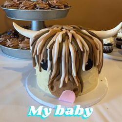 Whipped Cupcakes & Pastisserie - Baby shower cake and cupcakes. Highland cow!