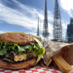 Hawkins House of Burgers - Fat Burger (with cheese) + French Fries - with a juxtaposition of the Watts Towers