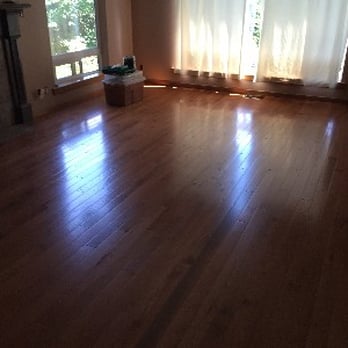 Xtreme Home Improvements - a living room with hardwood floors - General Contractors Near Me Xtreme Home Improvements - a living room with hardwood floors - General Contractors Near Me
