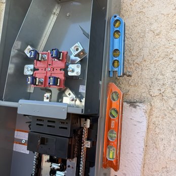 Genesis Electric - This is a picture of the new panel being installed - Electricians Near Me