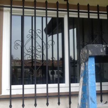 Airtight Vinyl Siding and Windows - Kitchen window with bars back in place.  Looking sharp. - Windows Installation Near Me - Soquel, California