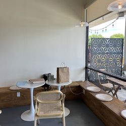 Seating area with tables and along the window