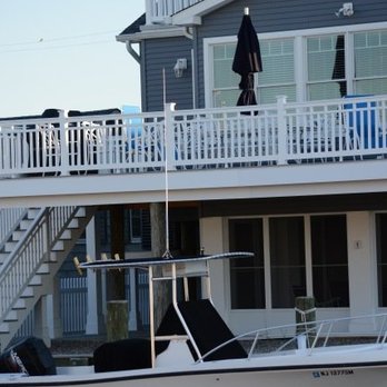 The Premier Deck Builder - White deck and steps by Premier Deck Builders - Decks & Railing Near Me The Premier Deck Builder - White deck and steps by Premier Deck Builders - Decks & Railing Near Me