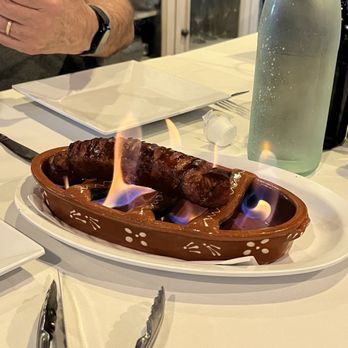 Lisbon Portuguese Restaurant - Chourico a Bombeiro (flaming Portuguese Sausage) - Portuguese Near Me - Orlando, Florida Lisbon Portuguese Restaurant - Chourico a Bombeiro (flaming Portuguese Sausage) - Portuguese Near Me - Orlando, Florida