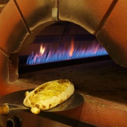 Roma Meditteranean Restaurant - Oven baked Italian pizza from Roma Restaurant