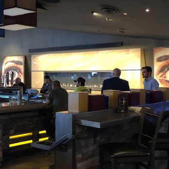 SG Bar - The fireplace on the west wall with the two large eyes. - Sports Bars Near Me - Las Vegas, Nevada SG Bar - The fireplace on the west wall with the two large eyes. - Sports Bars Near Me - Las Vegas, Nevada