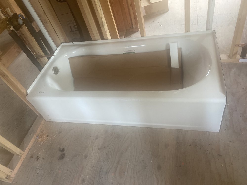 Slide of The in and out plumbing guy