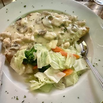Flanagan's on Main - whiskey chicken boxty with mushroom sauce and side of vegetables - Irish Near Me - Park City, Utah Flanagan's on Main - whiskey chicken boxty with mushroom sauce and side of vegetables - Irish Near Me - Park City, Utah
