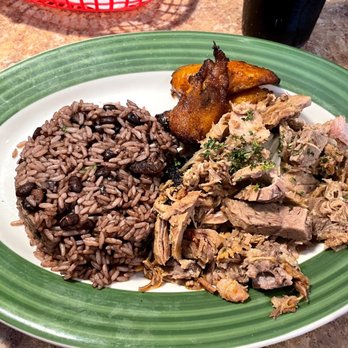 Romeito Cuban Restaurant - Lechon asado with fried plantains and arroz moro - Cuban Near Me - Olathe, Kansas Romeito Cuban Restaurant - Lechon asado with fried plantains and arroz moro - Cuban Near Me - Olathe, Kansas