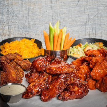 Wing Squad - a platter of chicken wings, carrots, celery, and macaroni and cheese - Food Delivery Services Near Me Wing Squad - a platter of chicken wings, carrots, celery, and macaroni and cheese - Food Delivery Services Near Me