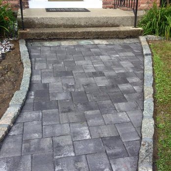 J. Escalera Landscaping - a walkway leading to a front door - Snow Removal Near Me - Patterson, New York