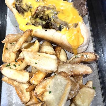 The Battery - Philly cheesesteak with fries - Salad Near Me - Homewood, Alabama The Battery - Philly cheesesteak with fries - Salad Near Me - Homewood, Alabama