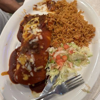 Chuy's - Roasted chicken burrito with Tex-Mex sauce. - Tex-Mex Near Me - Lutz, Florida Chuy's - Roasted chicken burrito with Tex-Mex sauce. - Tex-Mex Near Me - Lutz, Florida
