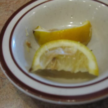 Denny's - Looks like our waitress picked these already chewed on lemons out of the trash can!!! - American Near Me - Fullerton, California Denny's - Looks like our waitress picked these already chewed on lemons out of the trash can!!! - American Near Me - Fullerton, California