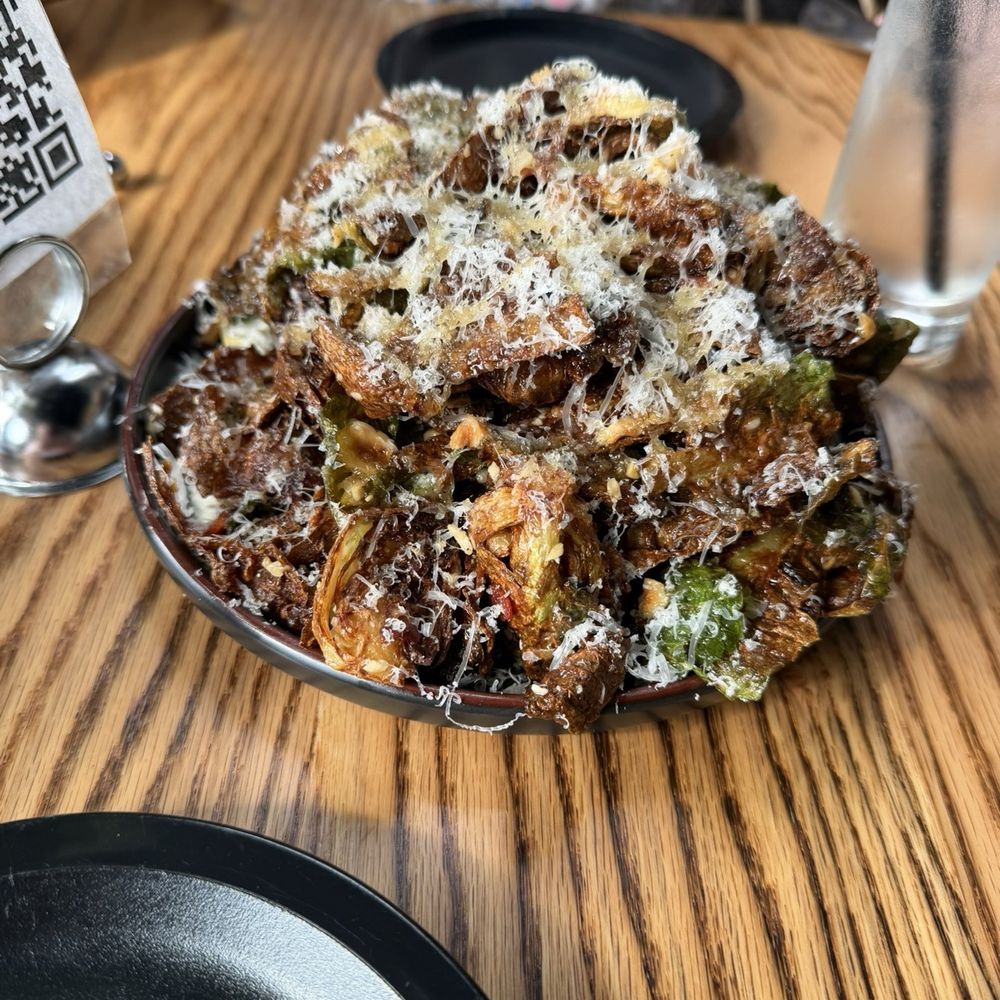 Pizza Althea - Huge pile of perfectly roasted Brussels sprouts with a lemon vinaigrette and guancale - Pizza Near Me - Pittston, Pennsylvania Pizza Althea - Huge pile of perfectly roasted Brussels sprouts with a lemon vinaigrette and guancale - Pizza Near Me - Pittston, Pennsylvania