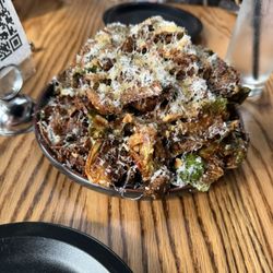 Pizza Althea - Huge pile of perfectly roasted Brussels sprouts with a lemon vinaigrette and guancale