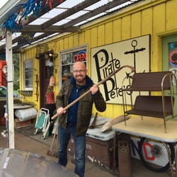 Canary Cottage's Pirate Pete's - My husband Ron and the front of the store!