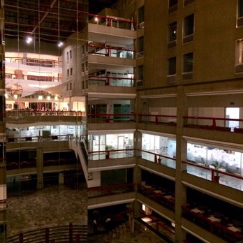 Fiesta Inn - The hotel is part of a larger city government building. The hotel is on the upper floors. A large roofed open area in the center. - Hotels Near Me - Tlalnepantla, COL