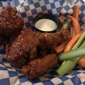 The Old Pequliar - Honey sriracha wings - Pubs Near Me - Seattle, Washington