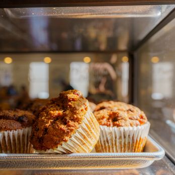 Southern Grounds - Freshly baked morning muffins from the pastry case at Southern Grounds, St. Augustine. - Coffee & Tea Near Me - St. Augustine, Florida