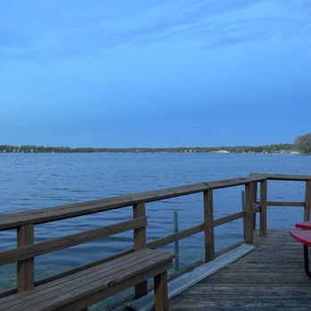 Pizza King - a picnic table on a pier overlooking the water - Pizza Near Me - North Webster, Indiana